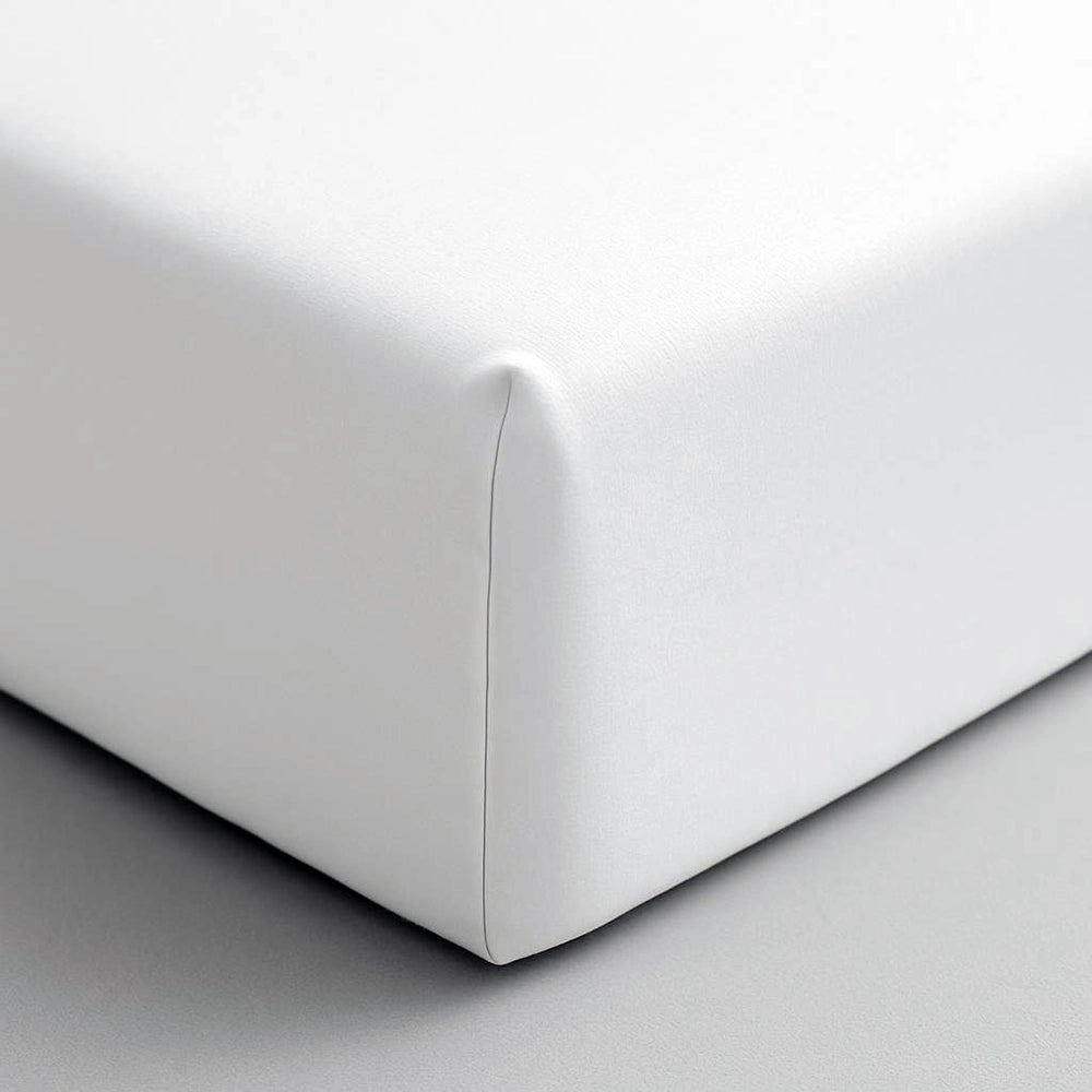 White cotton percale fitted sheet with 300 thread count, showcasing premium hospitality-grade bedding. Tailored design with precise edges and smooth finish, ideal for luxury hotels and discerning residential customers. Standard depth fitted sheet ensuring perfect mattress coverage.