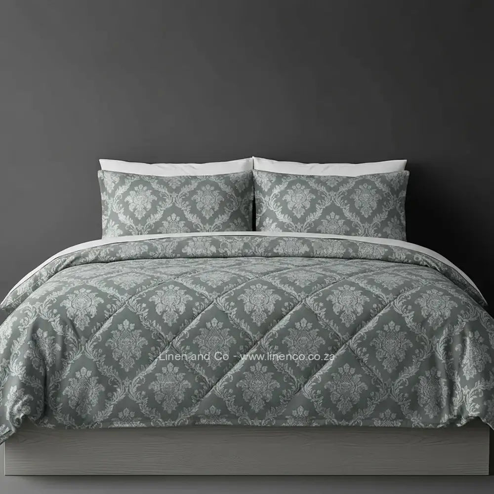 Luxury grey Brisbane comforter with quilted patterned design displayed on bed, featuring premium neutral tones and elegant texture, hospitality-grade bedding by Linen and Co