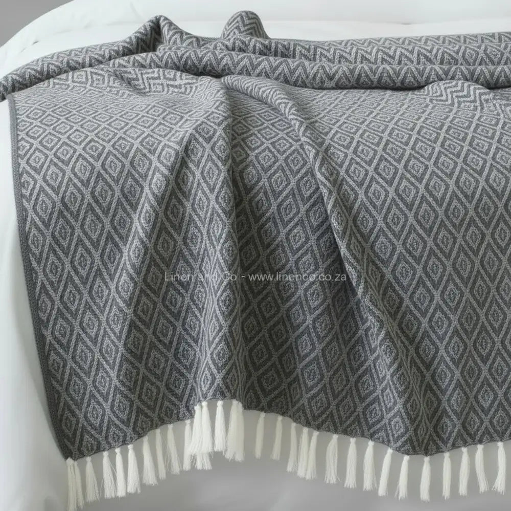 Grey cotton throw, 125x150cm, soft hospitality textile for professional hotel decor by Linen and Co.