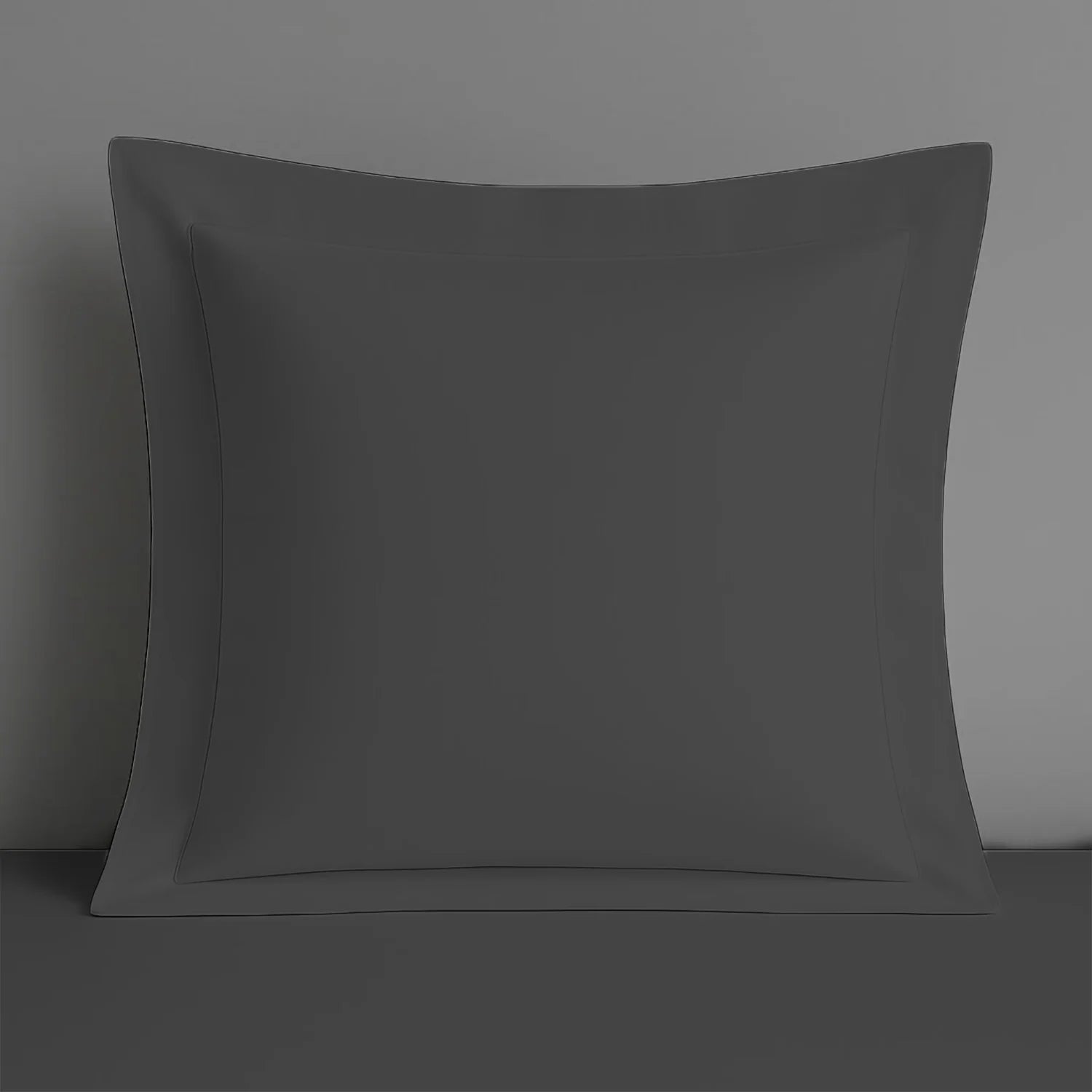 Grey Oxford continental pillow case on a grey background