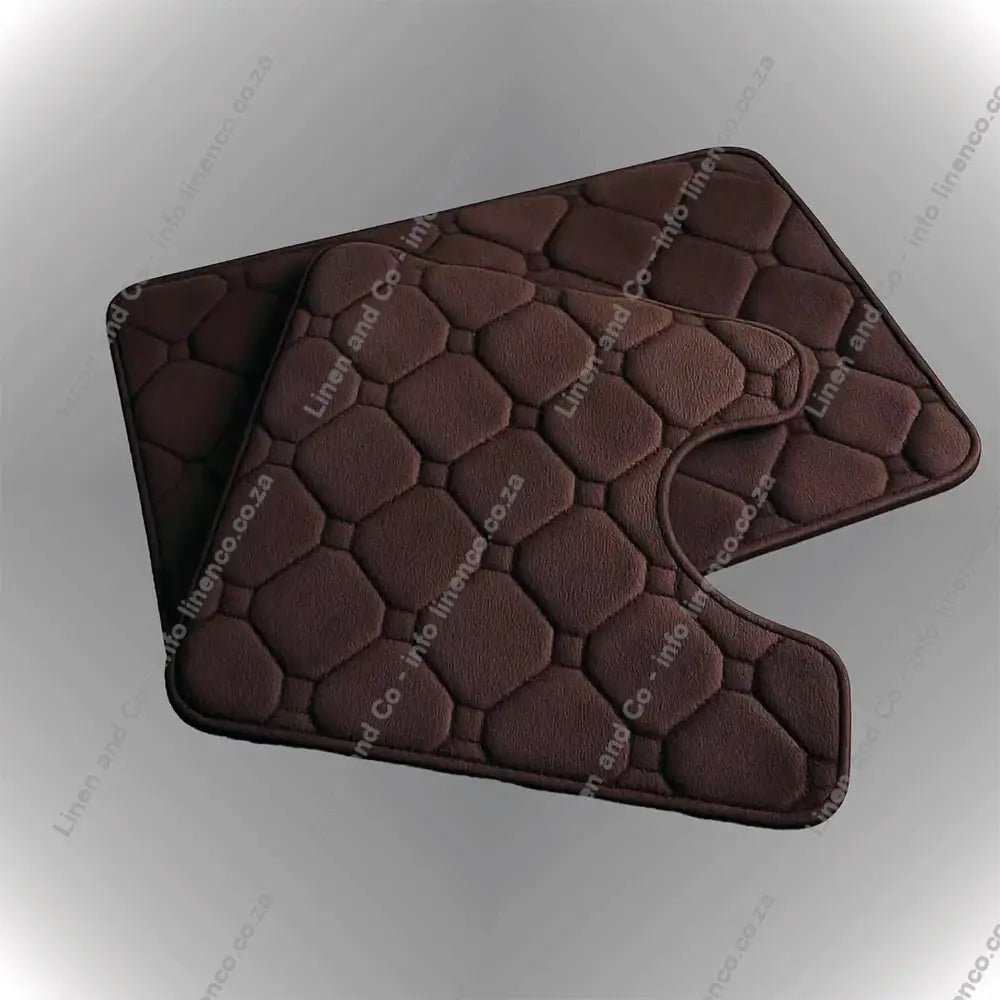 Chocolate Brown Memory Foam bath mat set textured bath mat on a light grey background