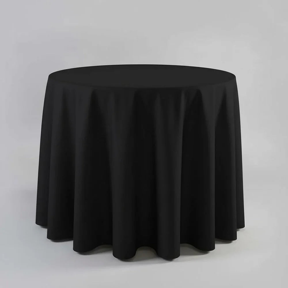 Black table Cloth on a round table with a light background