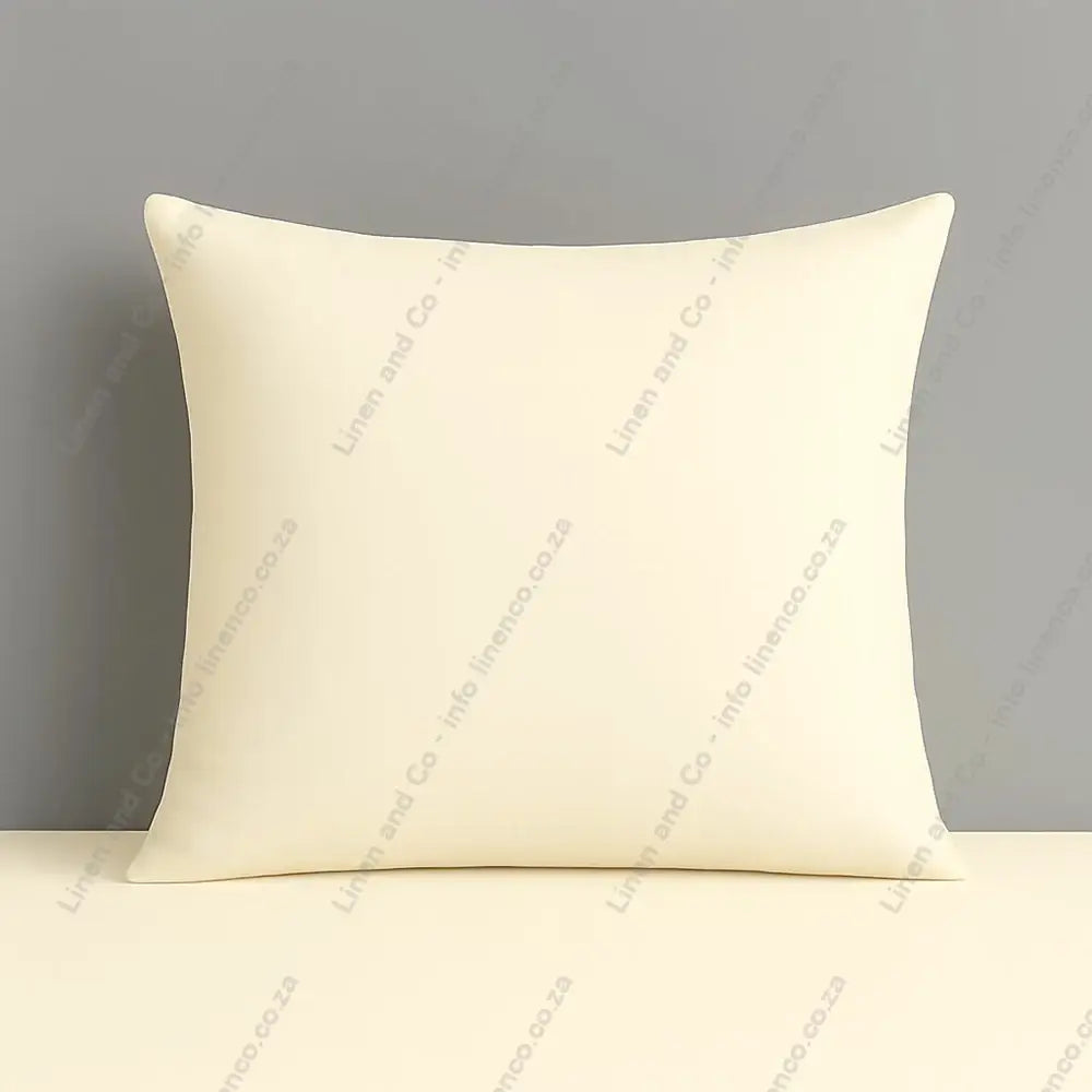 Pillow case cream plain continental on a grey background