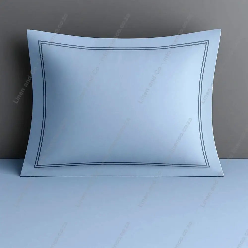 Duck Egg continental pillow case with two row satin stitch on a grey background.