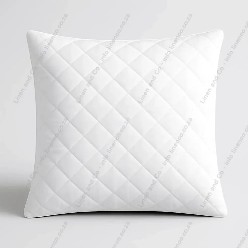 Continental quilted wetsafe pillow protectors on a light grey background