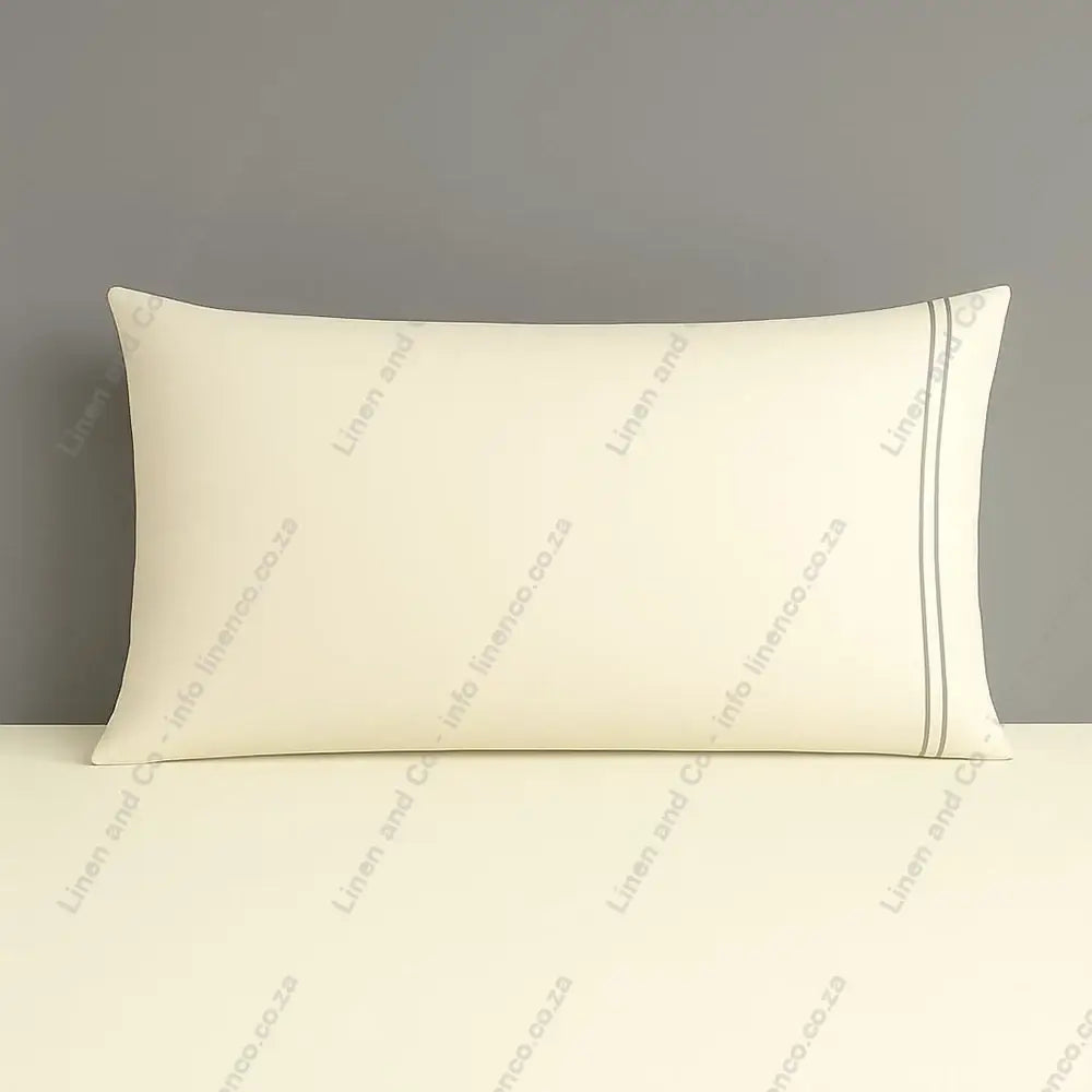 Cream Pillow Case Plain 2 Row Satin Stitch on a grey background