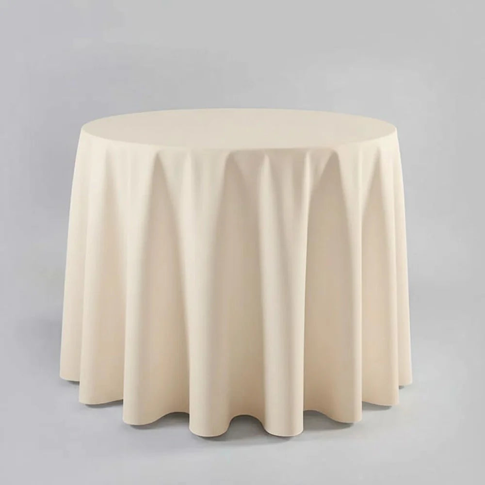 Cream table Cloth on a round table with a light background