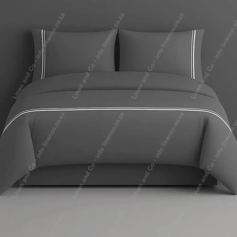 grey plain duvet cover set with two row satin stitch on a grey background