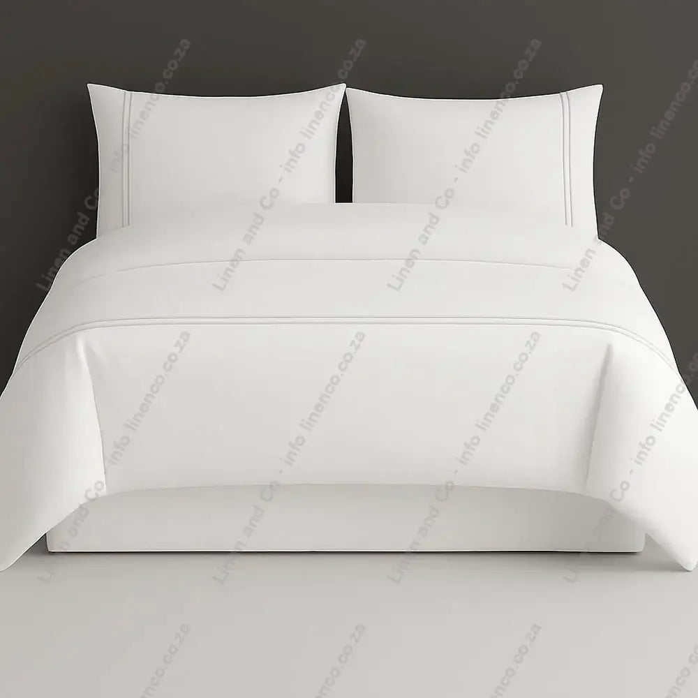 white plain duvet cover set with two row satin stitch on a grey background