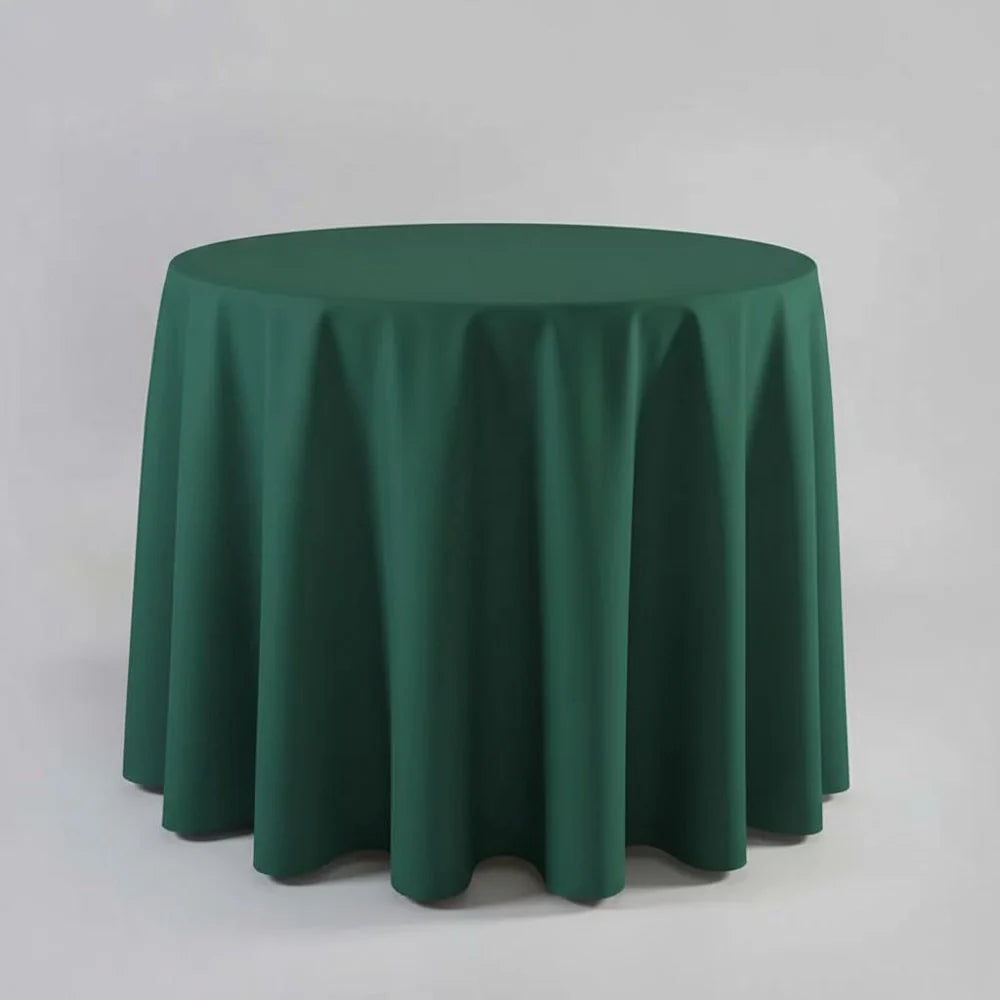 Hunter Green table Cloth on a round table with a light background