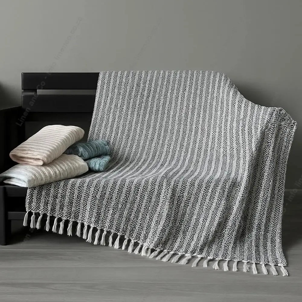 Cotton Throw Joy Design with Grey Background.