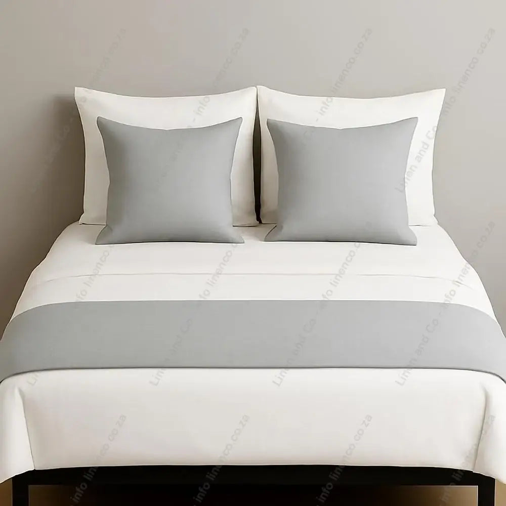 Linen and Co Light Grey decorative bed end runner with matching scatter pillows on white linen with a grey background