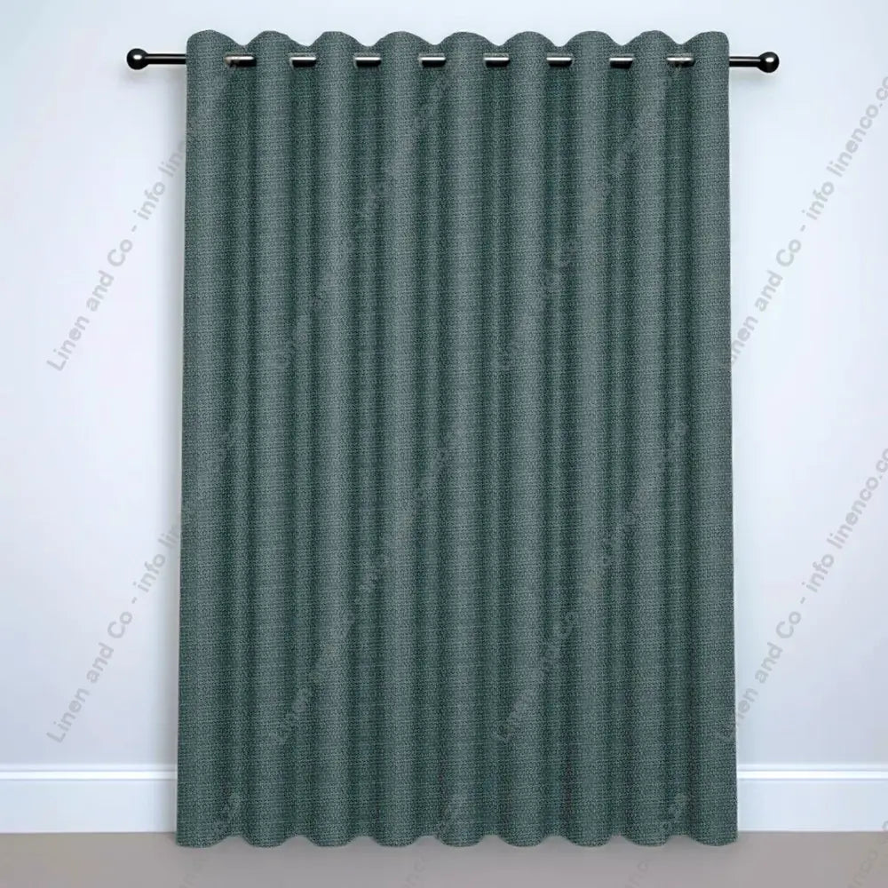 Marine Eyelet Curtain on a silver rod