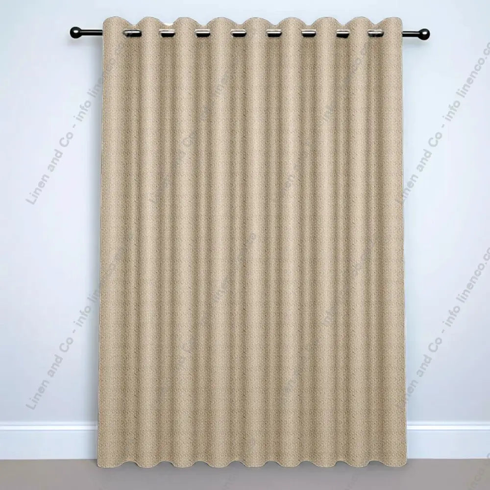 Natural Eyelet curtain on a silver curtain rod
