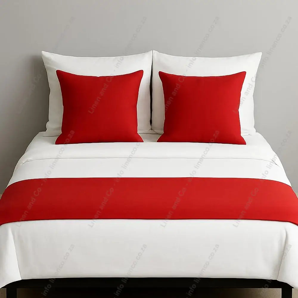 Linen and Co Red decorative bed end runner with matching scatter pillows on white linen with a grey background