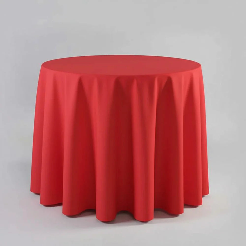 Red table Cloth on a round table with a light background