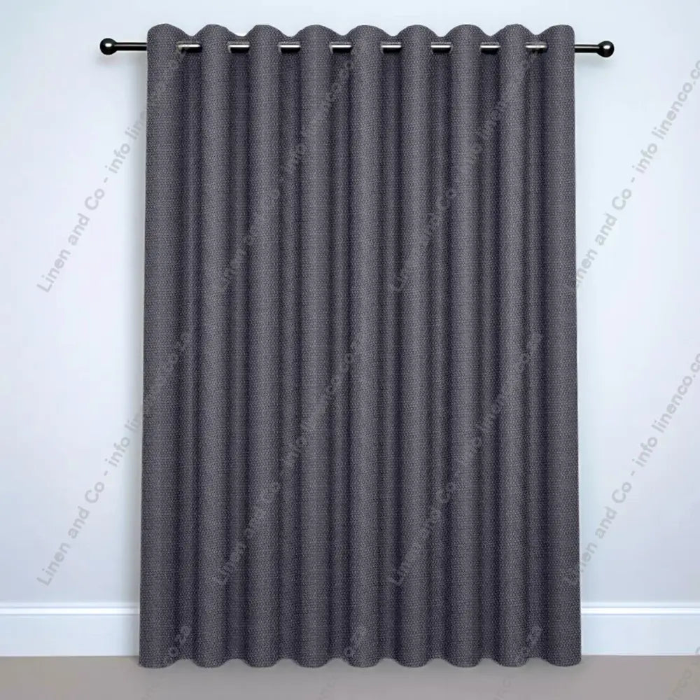 Silver Grey Eyelet curtain on a silver curtain rod