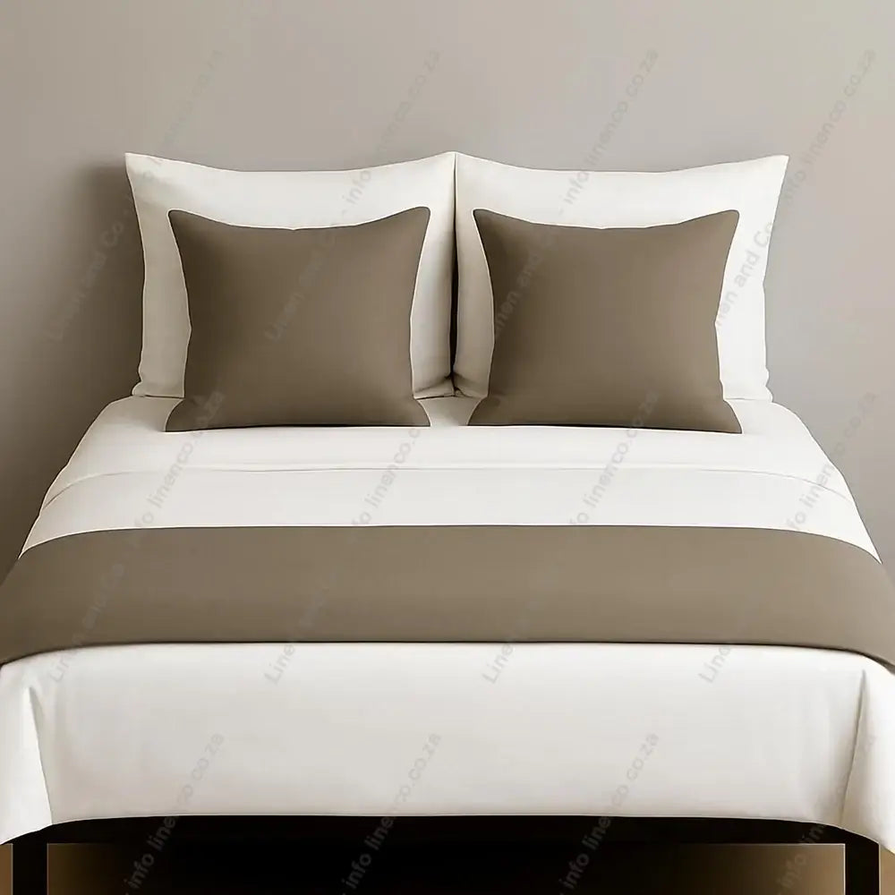 Linen and Co Stone decorative bed end runner with matching scatter pillows on white linen with a grey background 