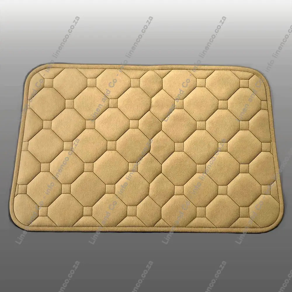 Stone Memory Foam textured bath mat on a light grey background