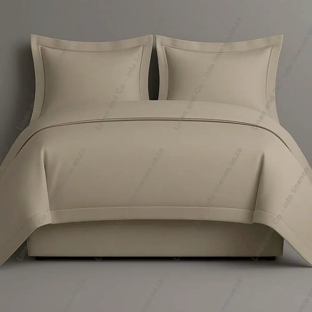 Stone oxford bedding set with two pillows on a grey background