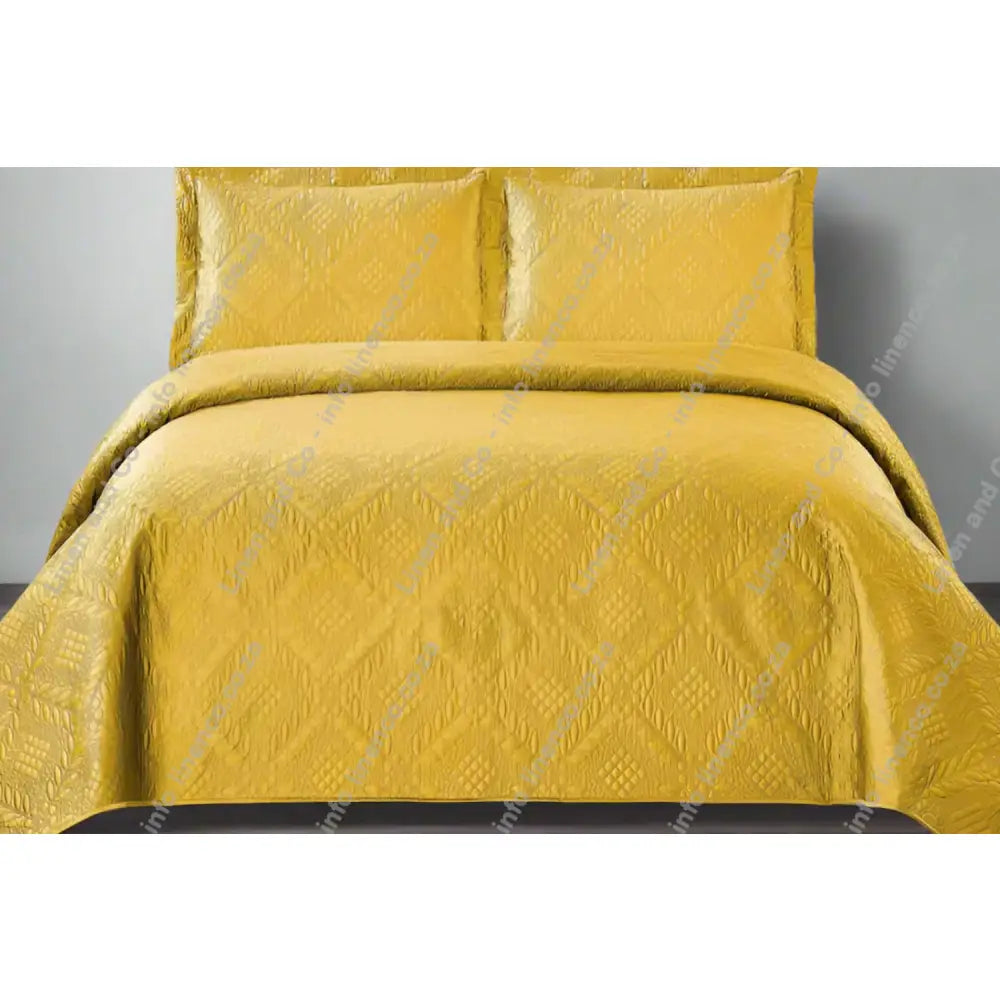 Mustard Istanbul design quilted bedspread with matching pillows
