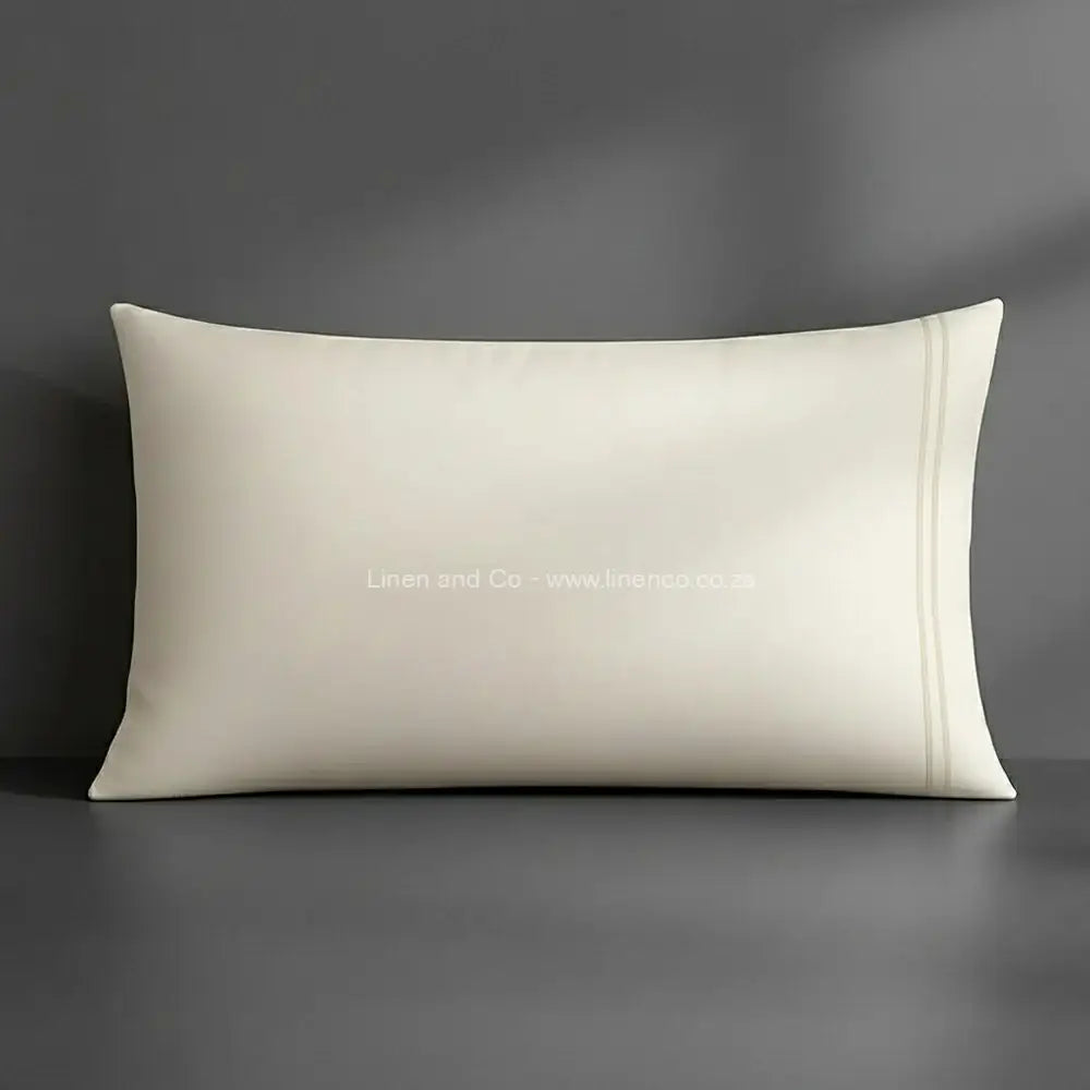 Pillow case cream with satin stitch oxford detail with grey background luxury hotel bed linen by Linen and Co