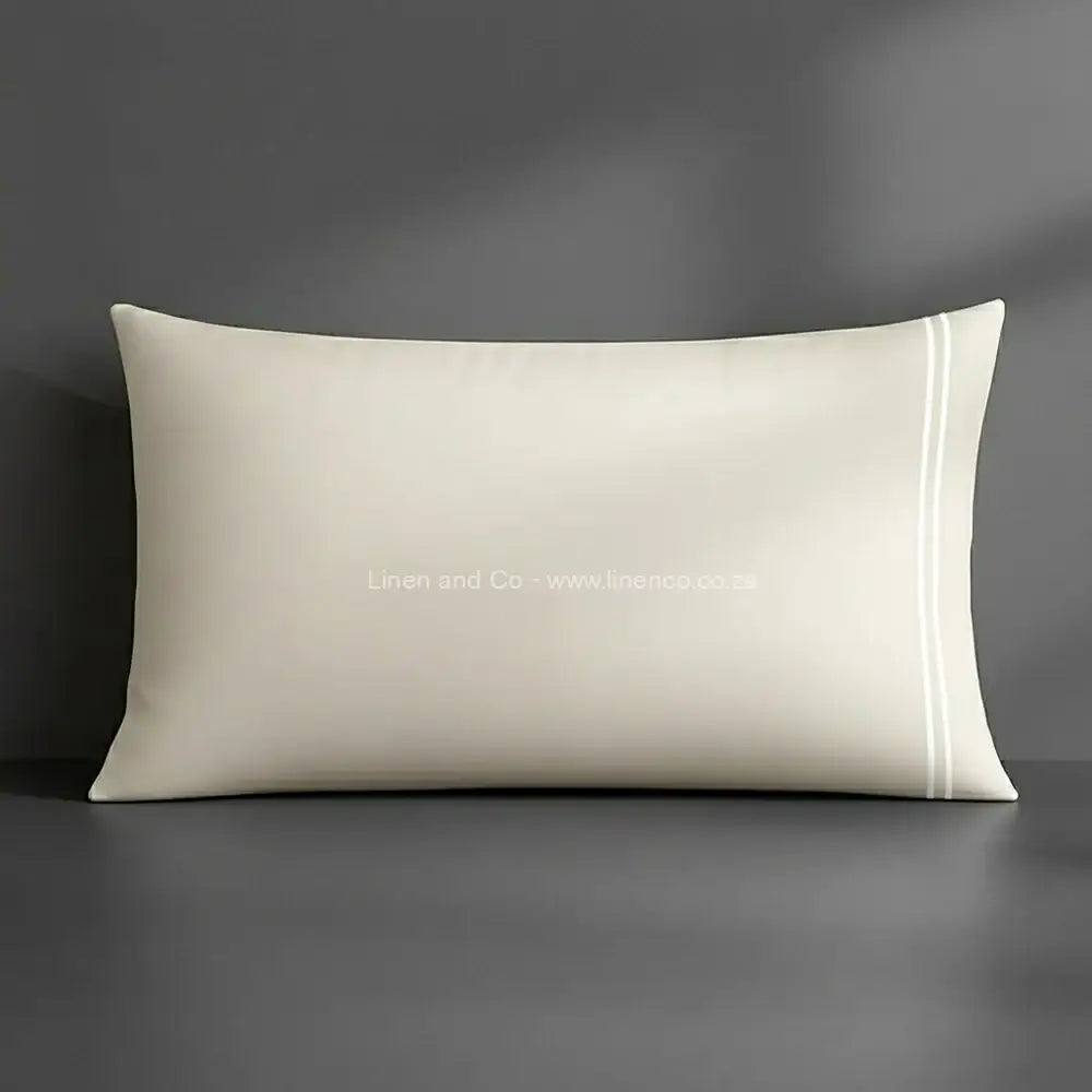 Pillow case cream with satin stitch oxford detail with grey background luxury hotel bed linen by Linen and Co