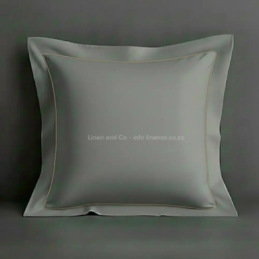 Grey continental oxford pillow case with stone one row satin stitch detail on a grey background. Luxury Hotel Linen by Linen and Co.