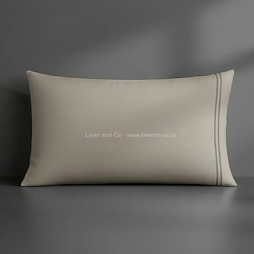 Pillow case stone with satin stitch oxford detail with grey background luxury hotel bed linen by Linen and Co