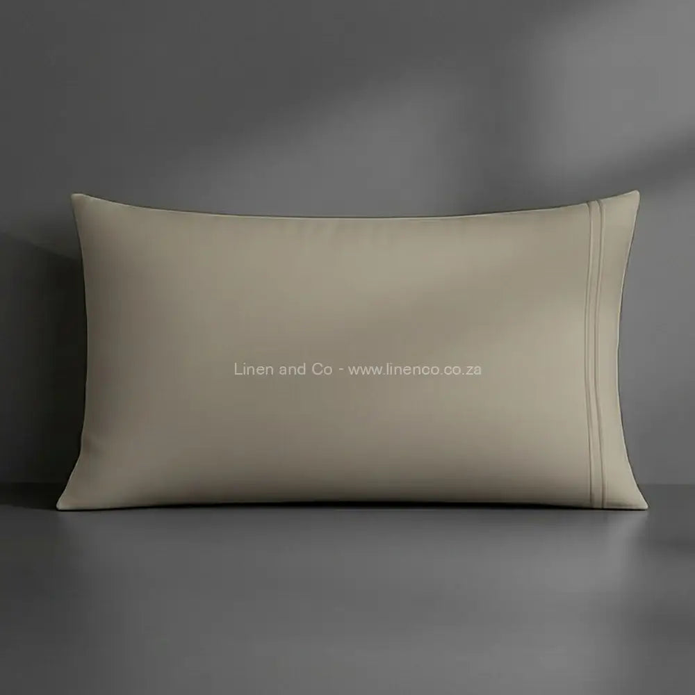 Pillow case stone with satin stitch oxford detail with grey background luxury hotel bed linen by Linen and Co