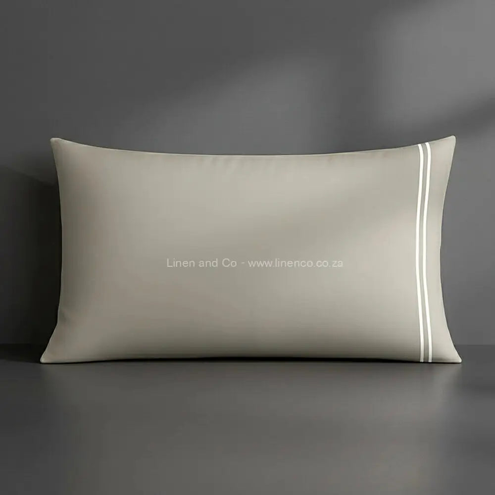Pillow case stone with satin stitch oxford detail with grey background luxury hotel bed linen by Linen and Co