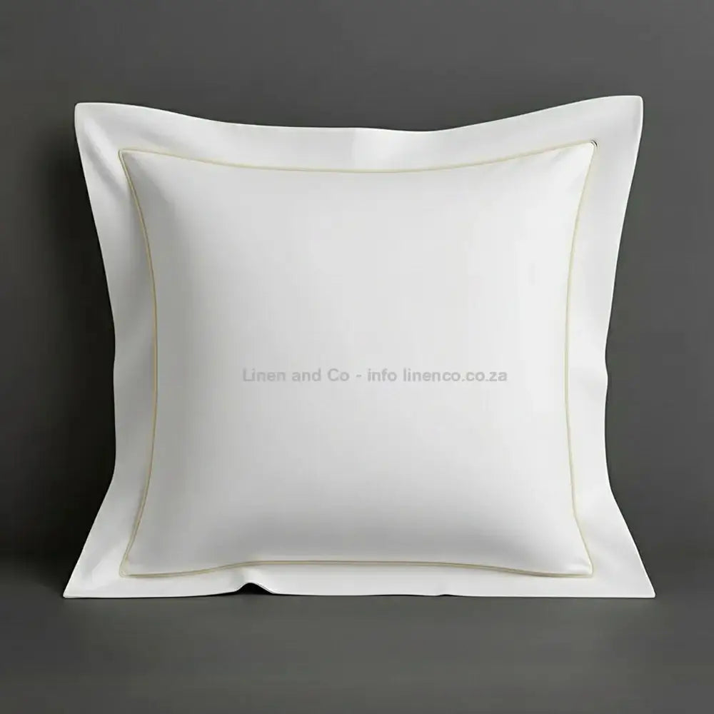 White continental oxford pillow case with cream one row satin stitch detail on a grey background. Luxury Hotel Linen by Linen and Co.