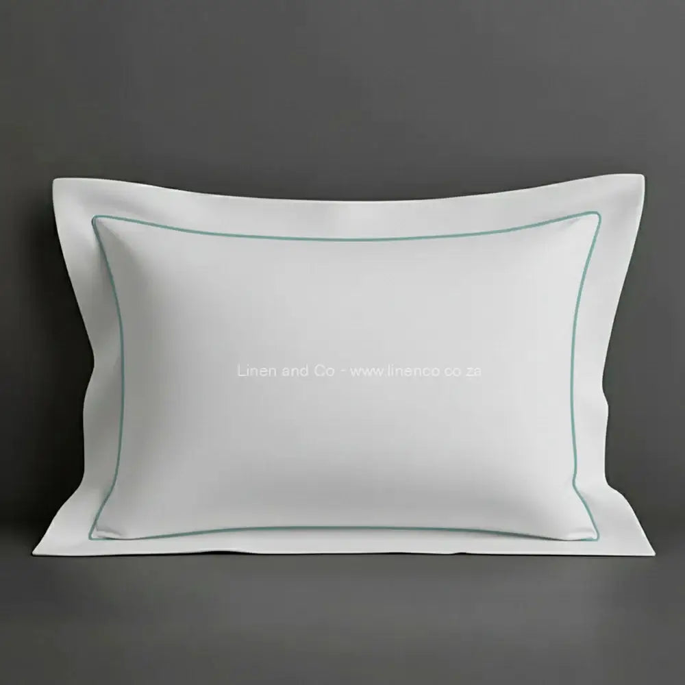 White oxford pillow case with duck egg one row satin stitch detail on a grey background. Luxury Hotel Linen by Linen and Co.