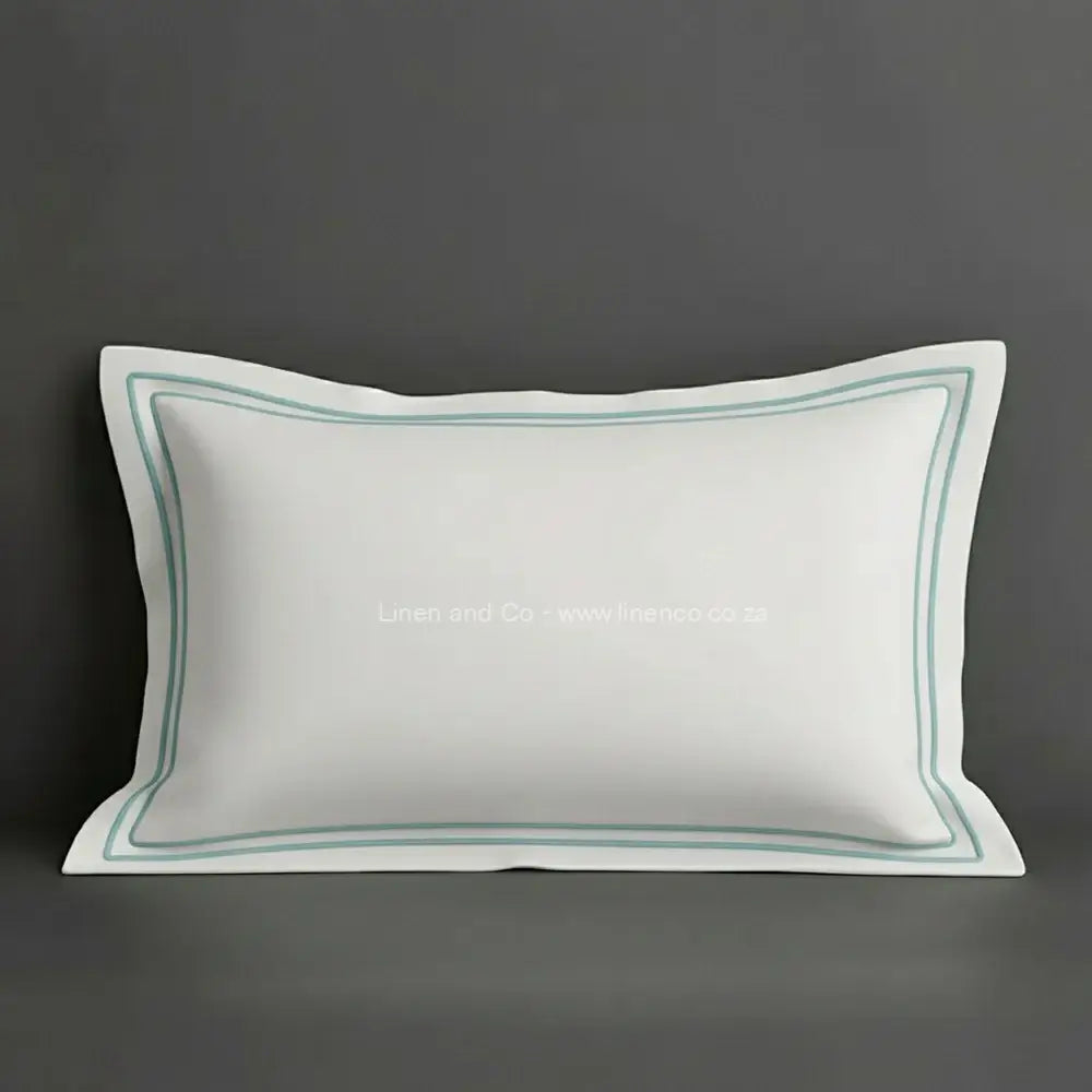 White oxford pillow case with duck egg  two row satin stitch detail on a grey background. Luxury Hotel Linen by Linen and Co.