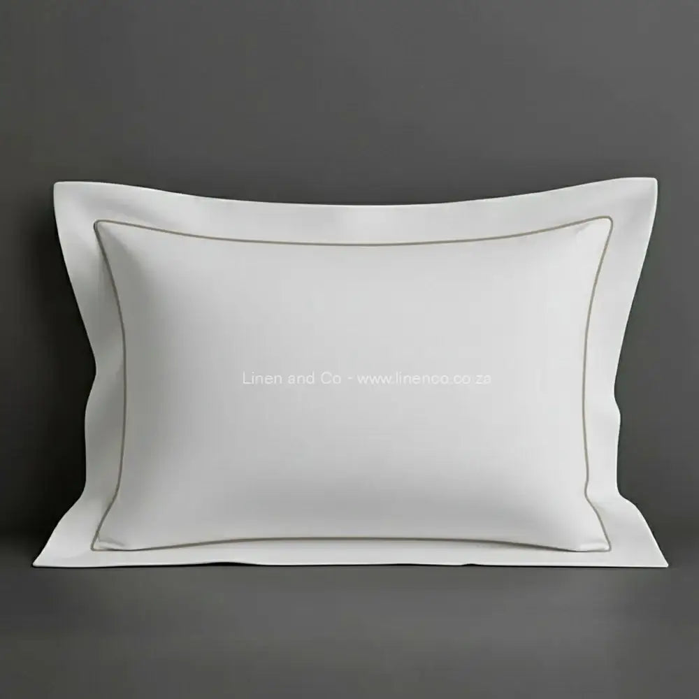 White oxford pillow case with stone one row satin stitch detail on a grey background. Luxury Hotel Linen by Linen and Co.