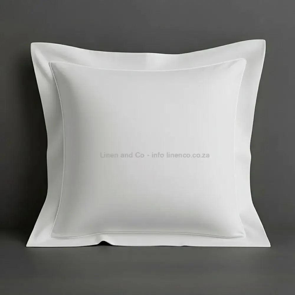 White continental oxford pillow case with white one row satin stitch detail on a grey background. Luxury Hotel Linen by Linen and Co.