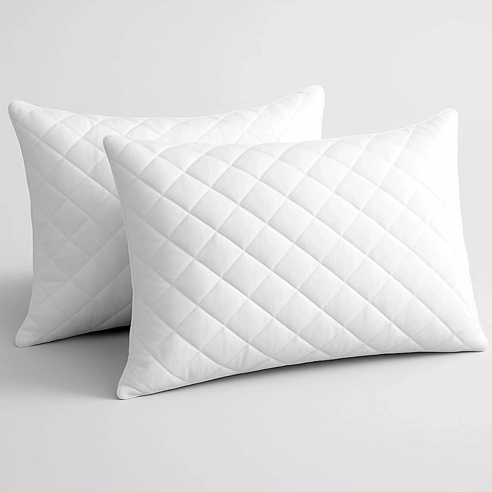 Quilted wetsafe pillow protector featuring waterproof protection and hypoallergenic properties. Premium hospitality-grade pillow protection designed for hotels, resorts, and residential use. Breathable quilted fabric ensures comfort while extending pillow lifespan and maintaining hygiene standards.
