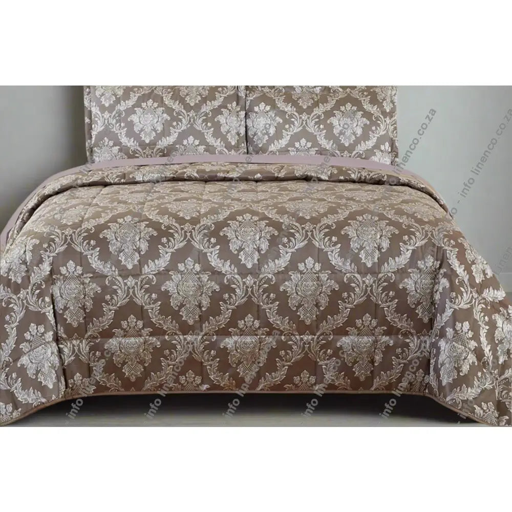 Stone Brisbane design Jacquard Quilted bedding set on a bed 