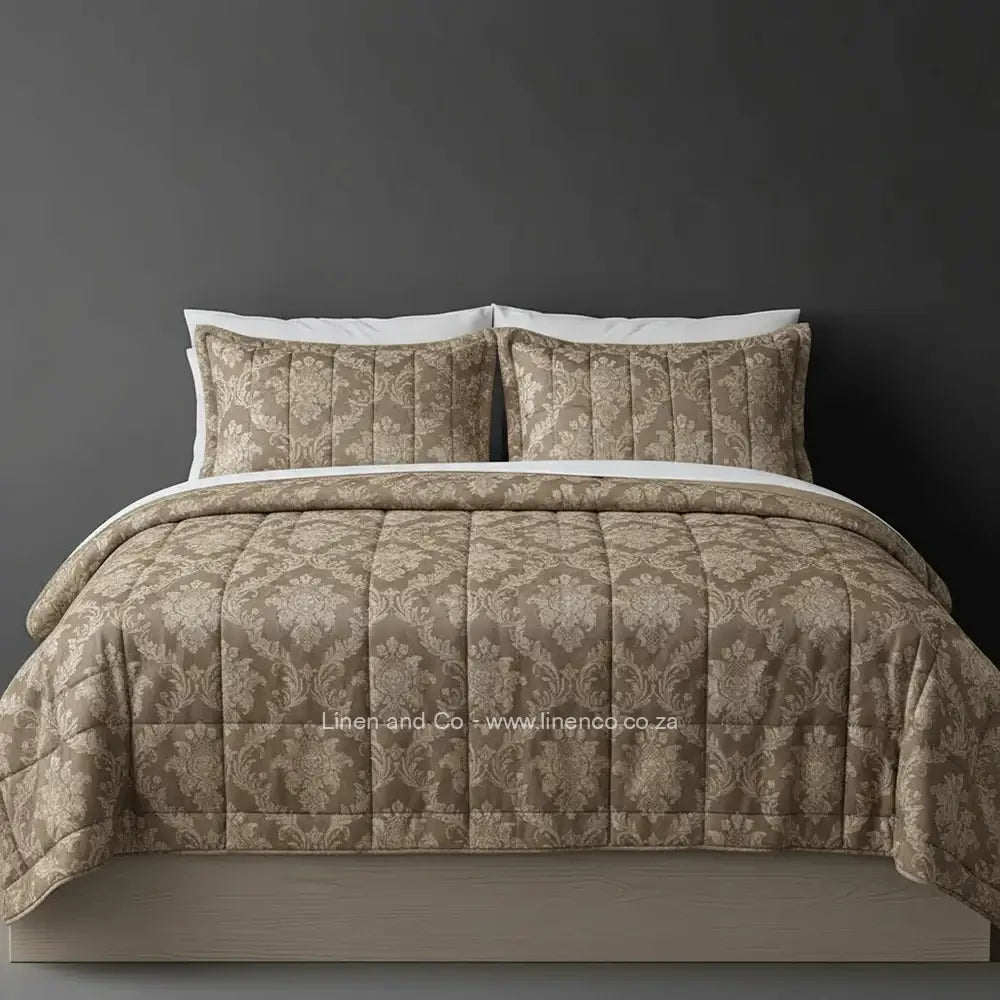 Luxury stone Brisbane comforter with quilted patterned design displayed on bed, featuring premium neutral tones and elegant texture, hospitality-grade bedding by Linen and Co