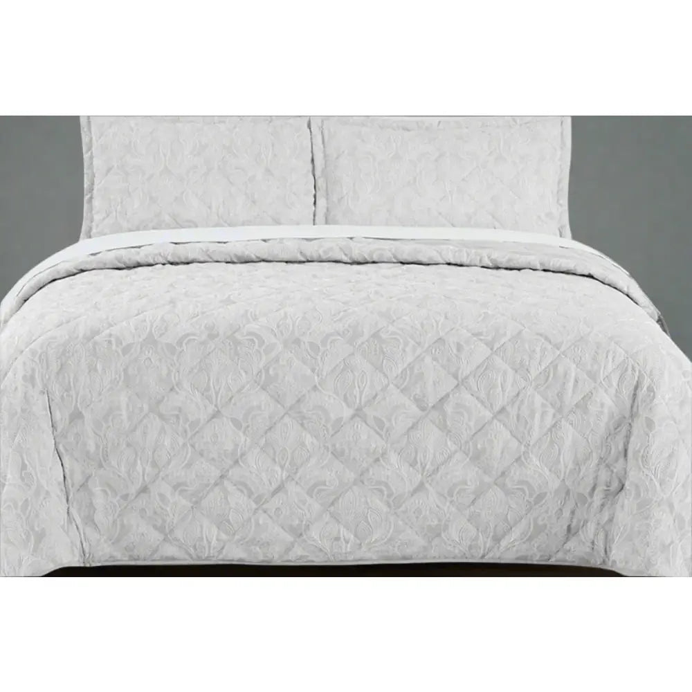 White Kensington Design Jacquard Quilted Bedspread with a grey background