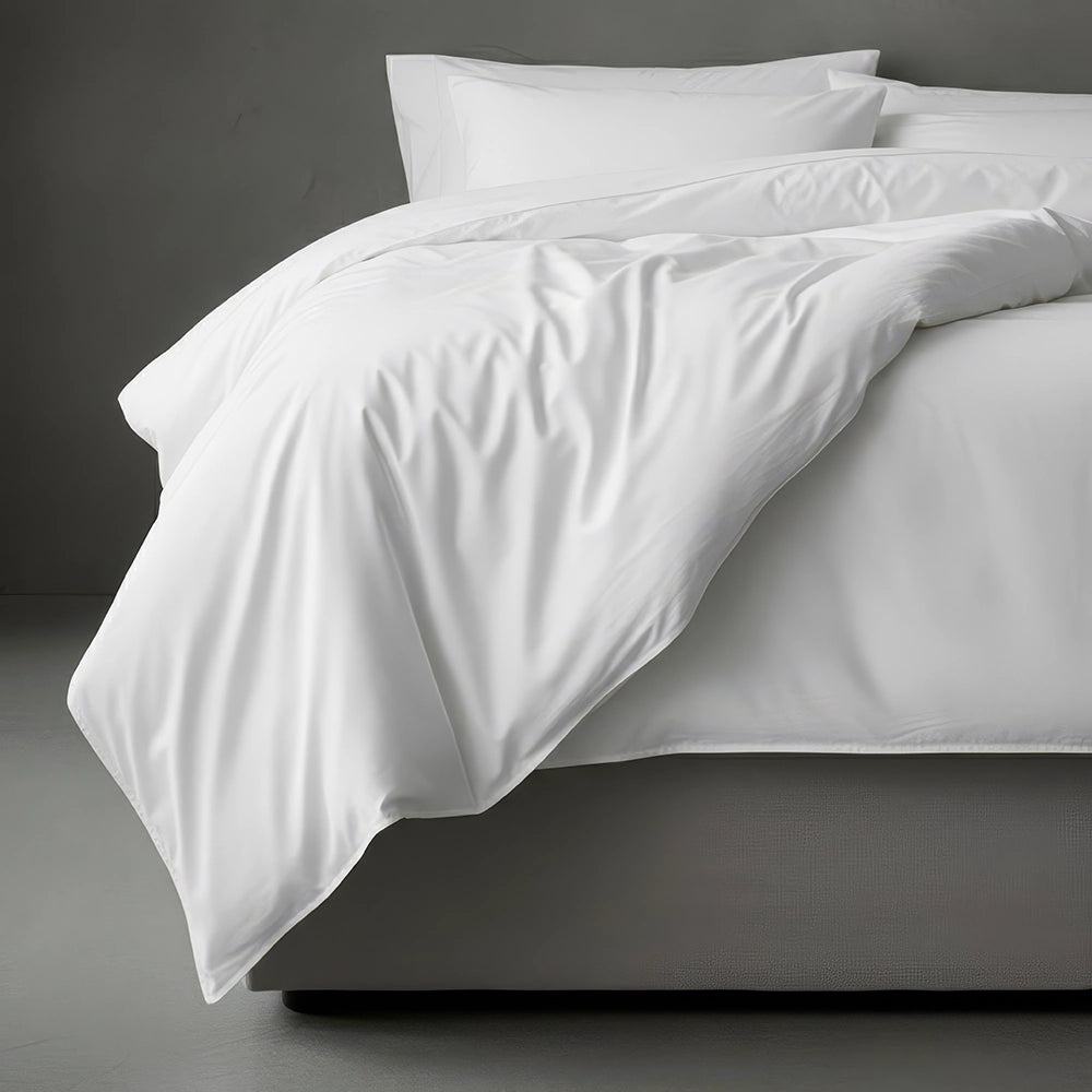 White plain duvet cover set by Linen and Co, showcasing premium hospitality-grade percale fabric in minimalist styling