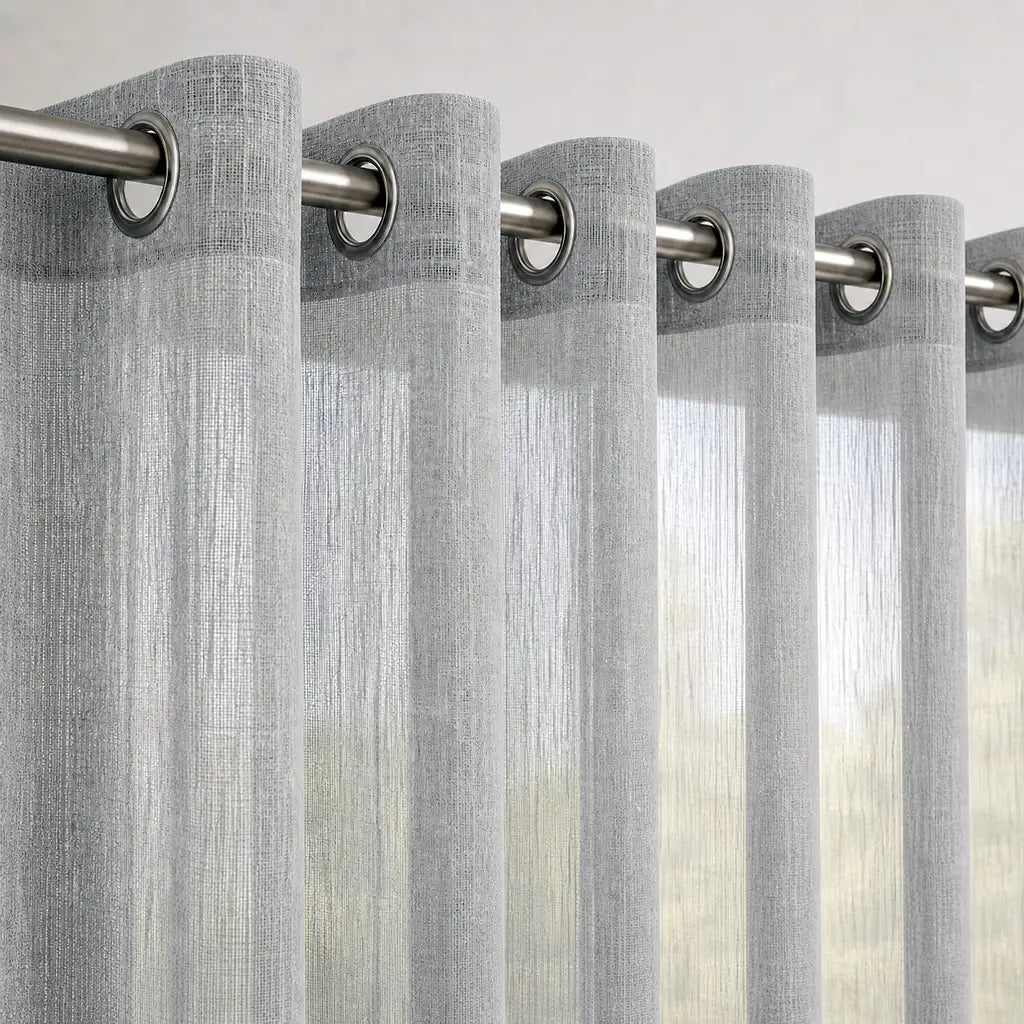 Close-up of Arissa Grey sheer eyelet curtain fabric and eyelet heading by Silk House for Linen & Co