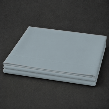 Duck Egg polycotton percale 200TC flat sheet, plain — on the bed.