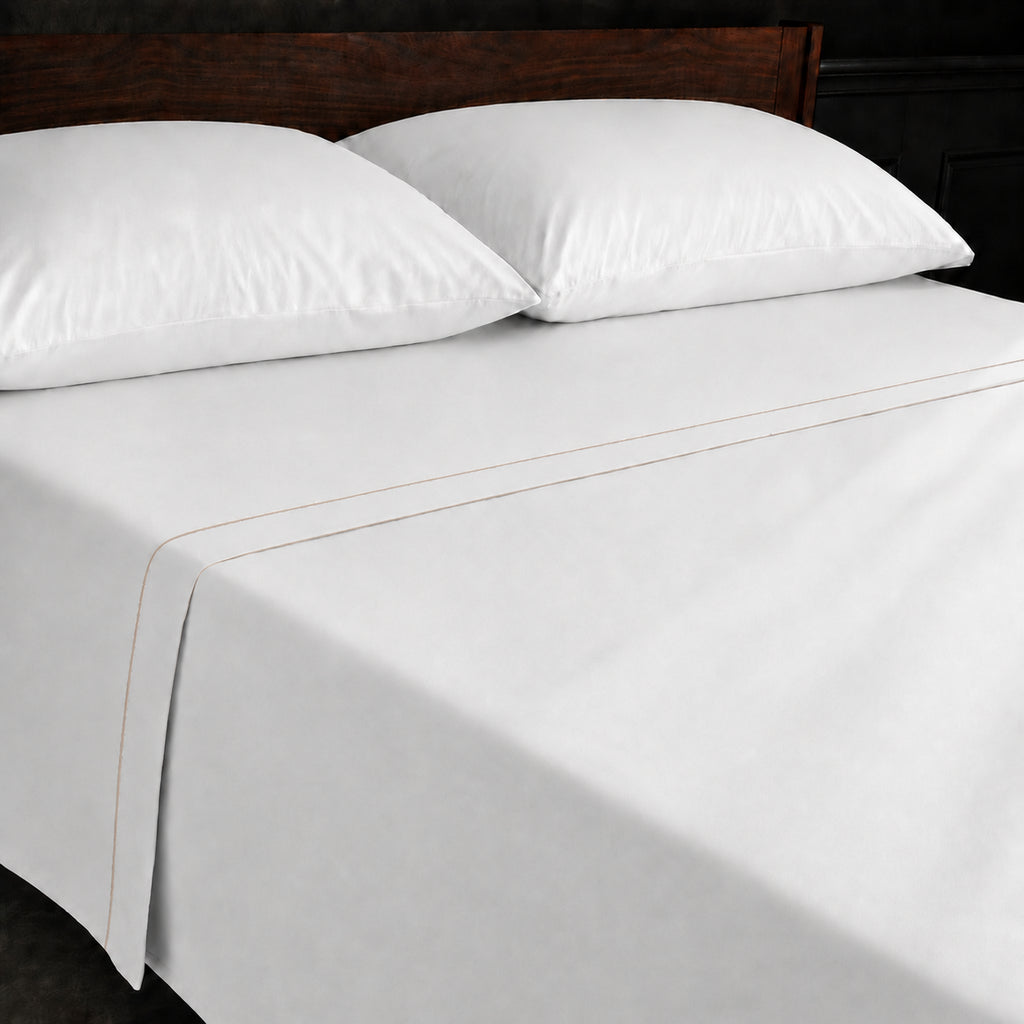 White Polycotton Percale 200TC flat sheet with Stone one row satin stitch - on the bed - Linen and Co