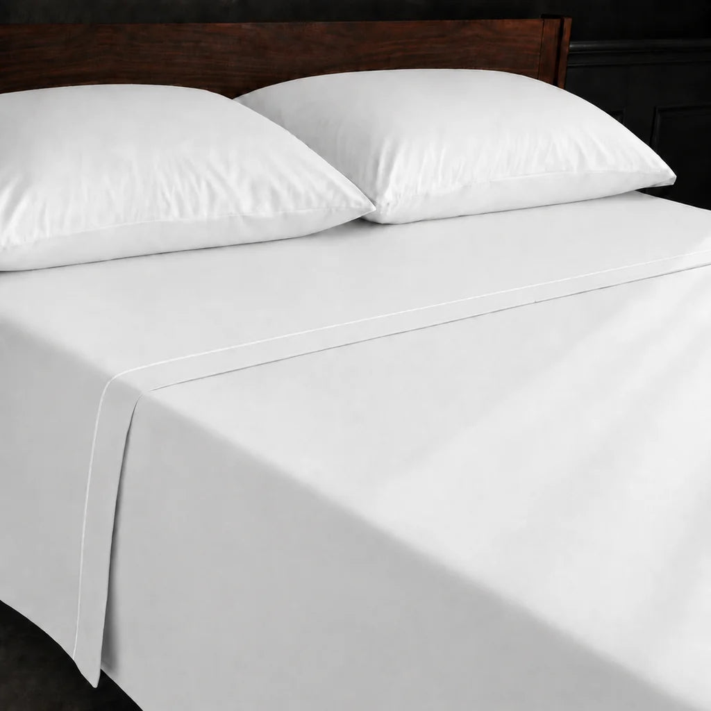White Polycotton Percale 200TC flat sheet with White one row satin stitch - on the bed - Linen and Co