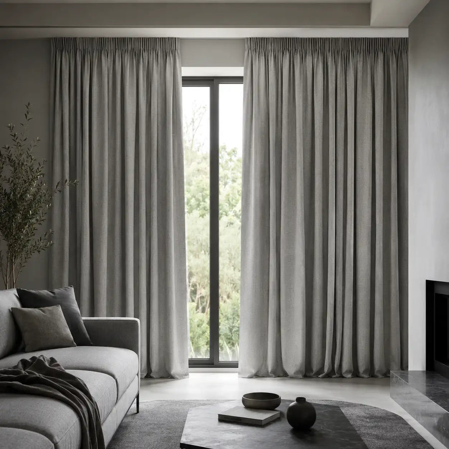 Greystone blockout curtains give a modern living room a clean, tailored finish.