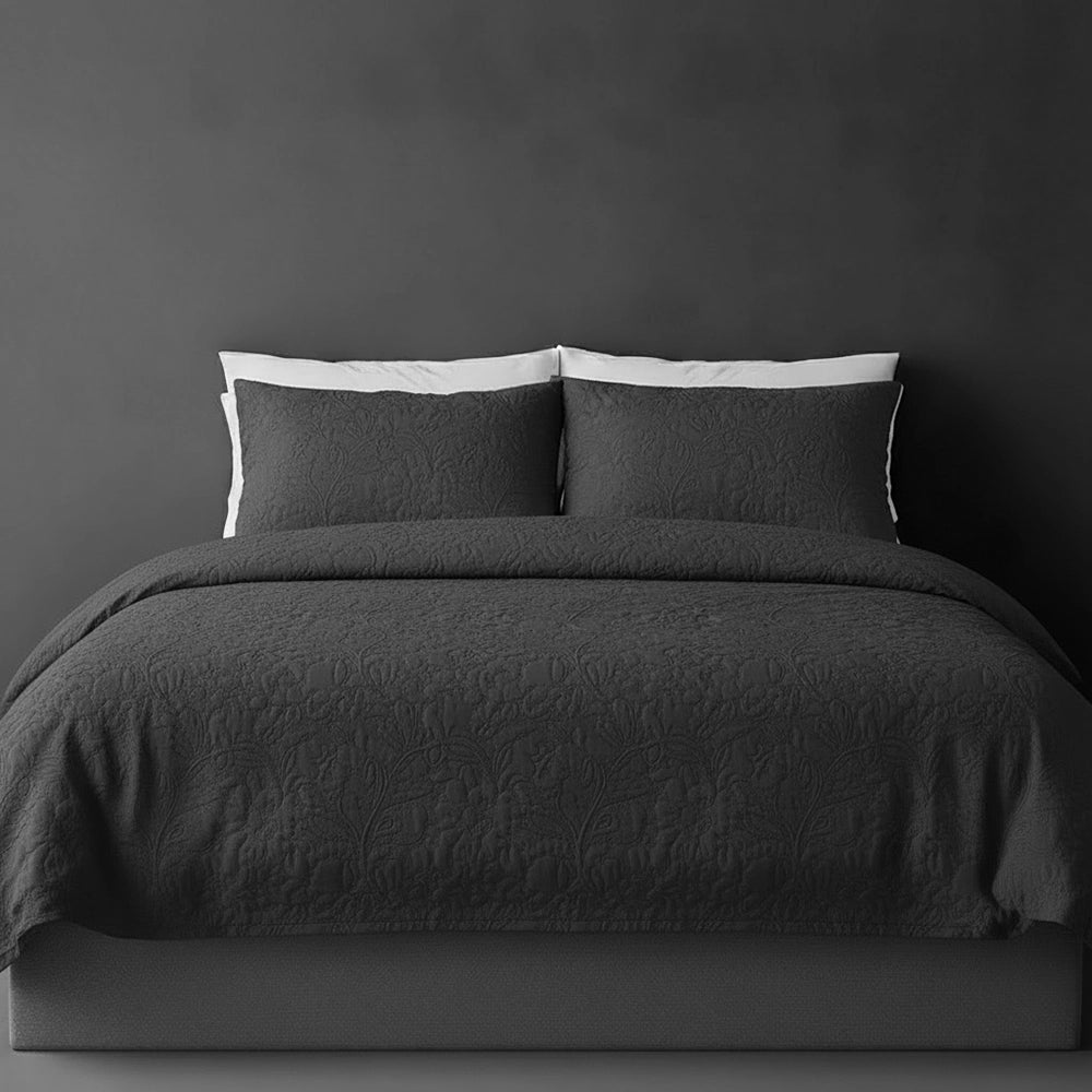 Charcoal Carmen bedspread on bed by Linen and Co - luxury hospitality bedspread with textured finish