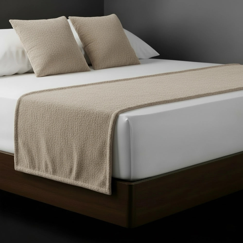 Stone chenille bed runner and cushions on white bed by Linen and Co - luxury hospitality bedding