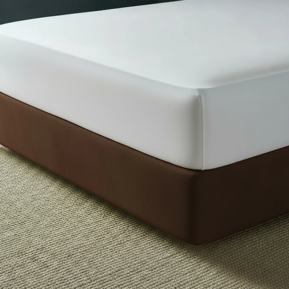 chocolate mock suede base wrap covering bed base with white fitted sheet on beige jute mat—luxury bed base cover by Linen & Co
