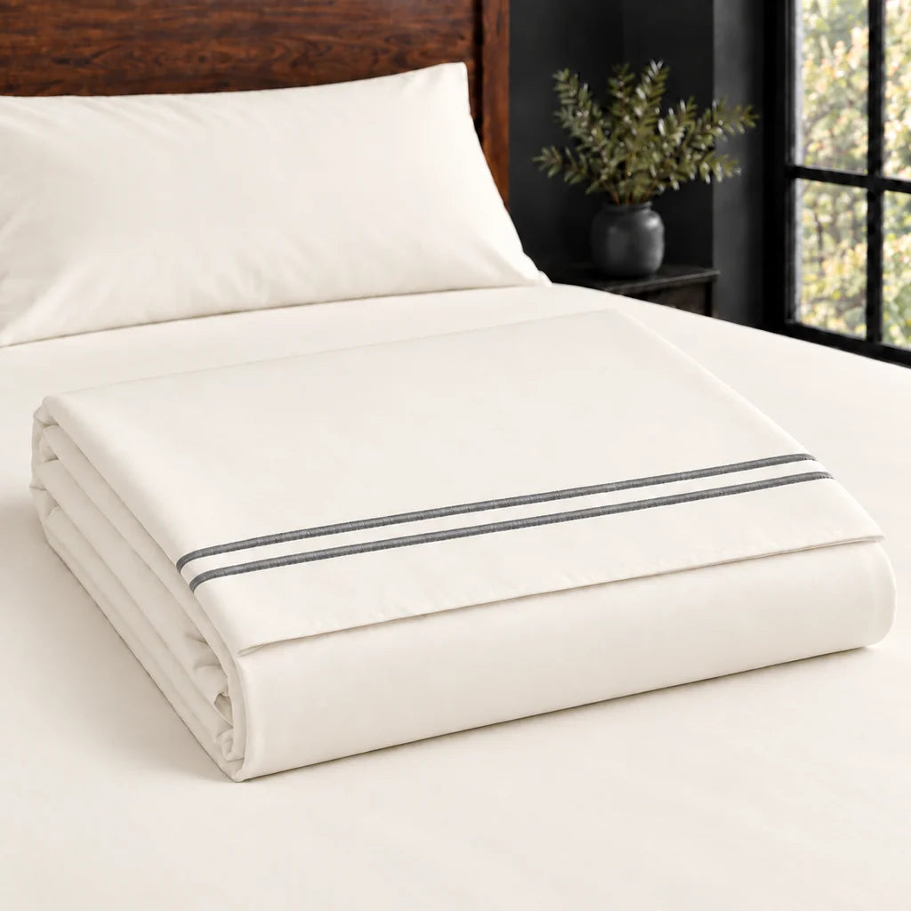 cream cotton percale 200tc flat sheet, two row grey satin stitch — construction — Linen and Co